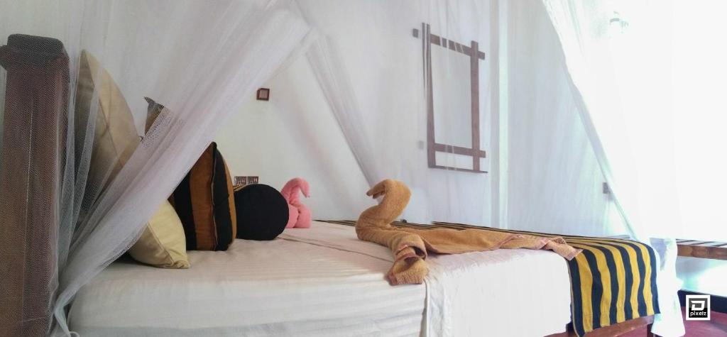 Postel nebo postele na pokoji v ubytování Ella River Face Inn