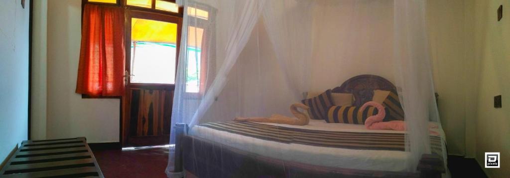 Postel nebo postele na pokoji v ubytování Ella River Face Inn