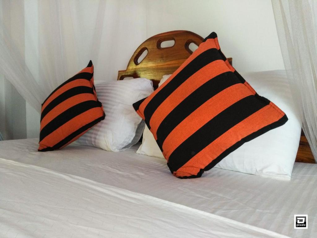 Postel nebo postele na pokoji v ubytování Ella River Face Inn