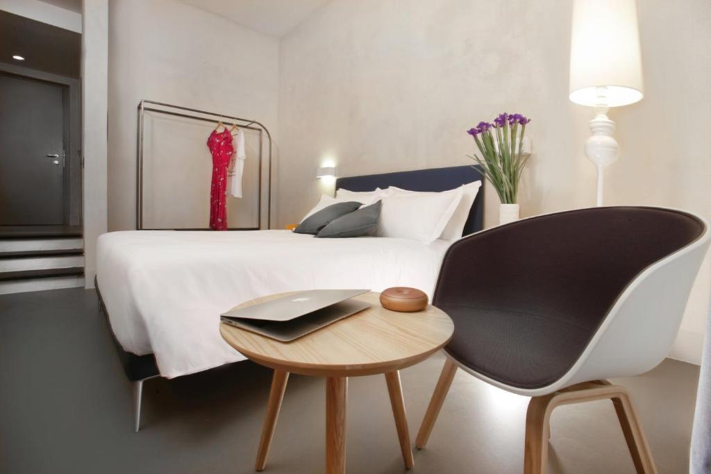 Łóżko lub łóżka w pokoju w obiekcie Hotel Palazzo Grillo