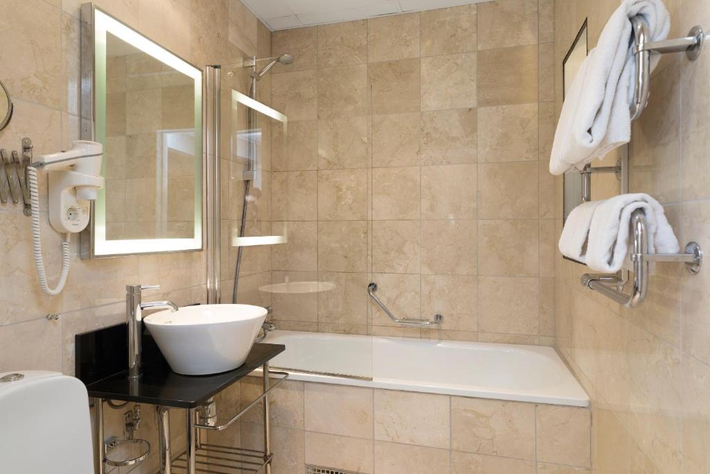 Koupelna v ubytování Elite Grand Hotel Norrköping