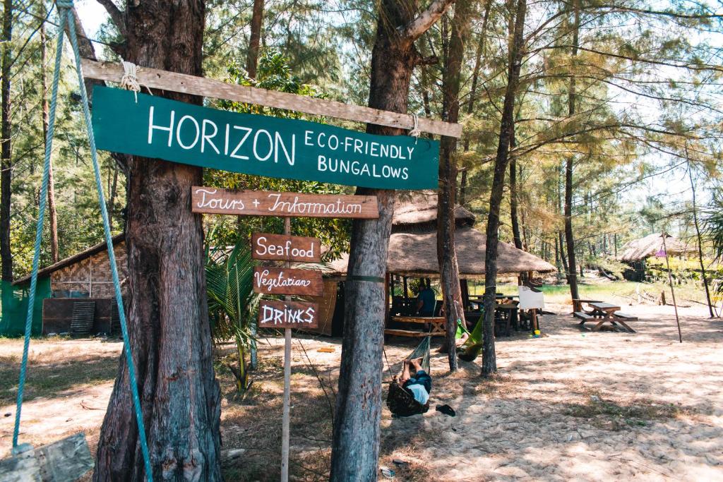 a sign for a hogenok ethnography bushy dwellings at Horizon Eco Resort in Ko Phra Thong