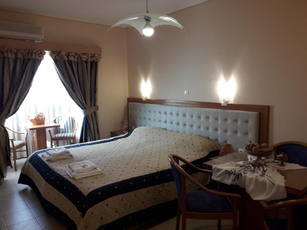 Postel nebo postele na pokoji v ubytování Studios Cosmopolitan