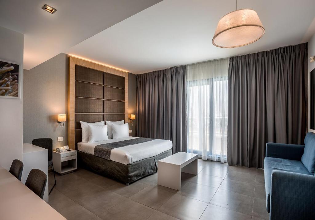 Ein Bett oder Betten in einem Zimmer der Unterkunft Hotel Astral Nirvana Club- Half Board