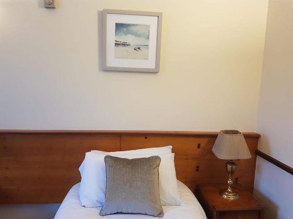 Postel nebo postele na pokoji v ubytování Padraicins B&B