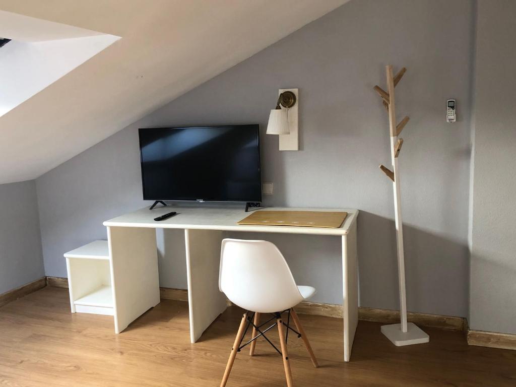TV a/nebo společenská místnost v ubytování Hotel Jakue