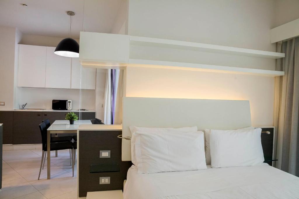 Kuchyň nebo kuchyňský kout v ubytování Lungotevere Suite