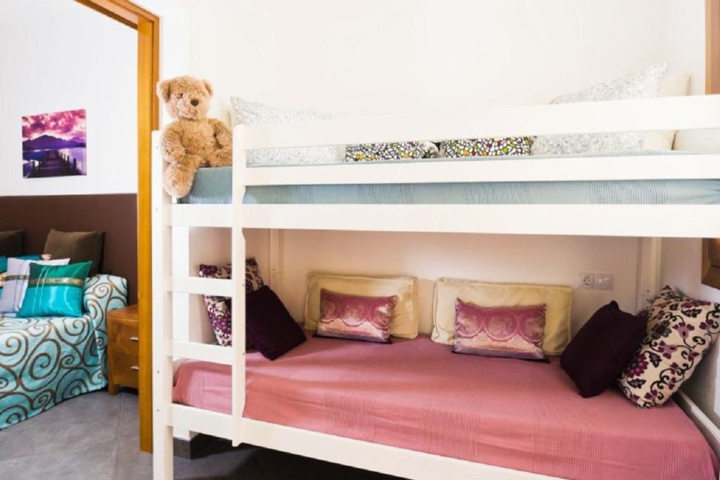 Postel nebo postele na pokoji v ubytování Sa Creu d´en Vall