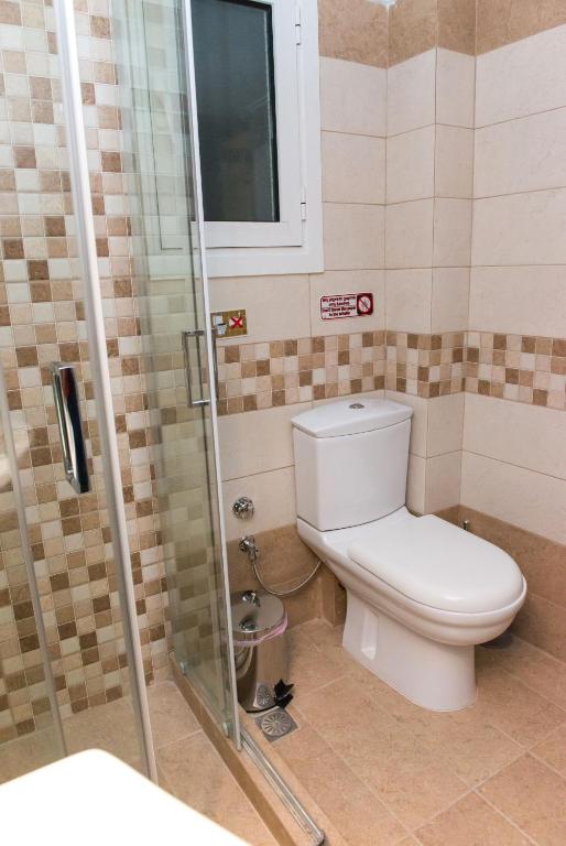 Koupelna v ubytování Lianos Apartments Business Class A