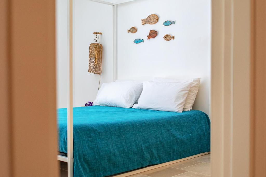 Postel nebo postele na pokoji v ubytování Doneduà B&B