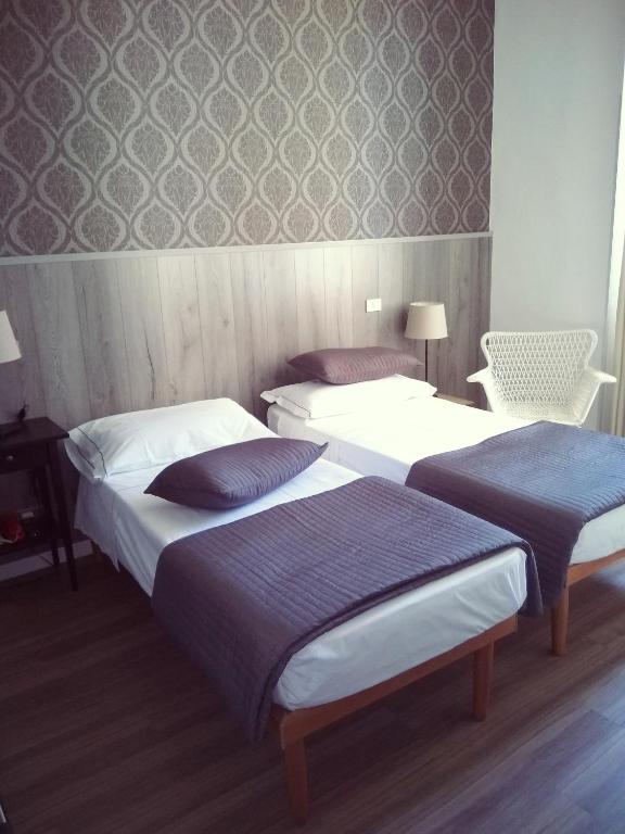 Postel nebo postele na pokoji v ubytování Hotel Malta