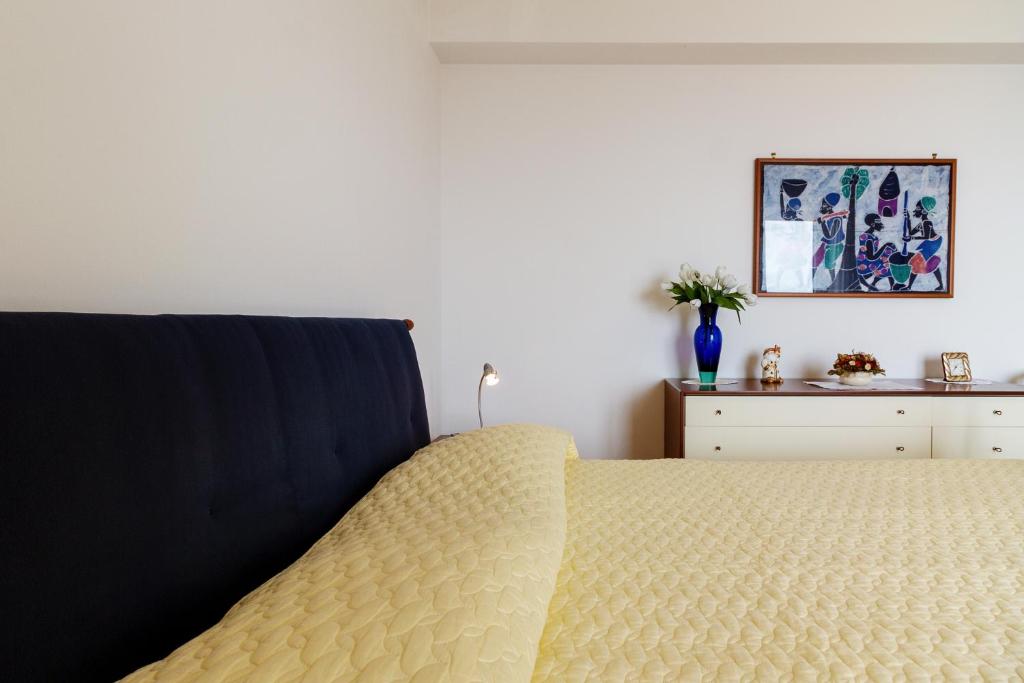 Posteľ alebo postele v izbe v ubytovaní Fontana Vecchia Seaview Apartment