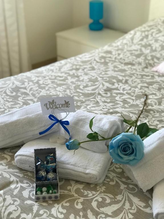 Postel nebo postele na pokoji v ubytování B&B Il Poeta sul Mare