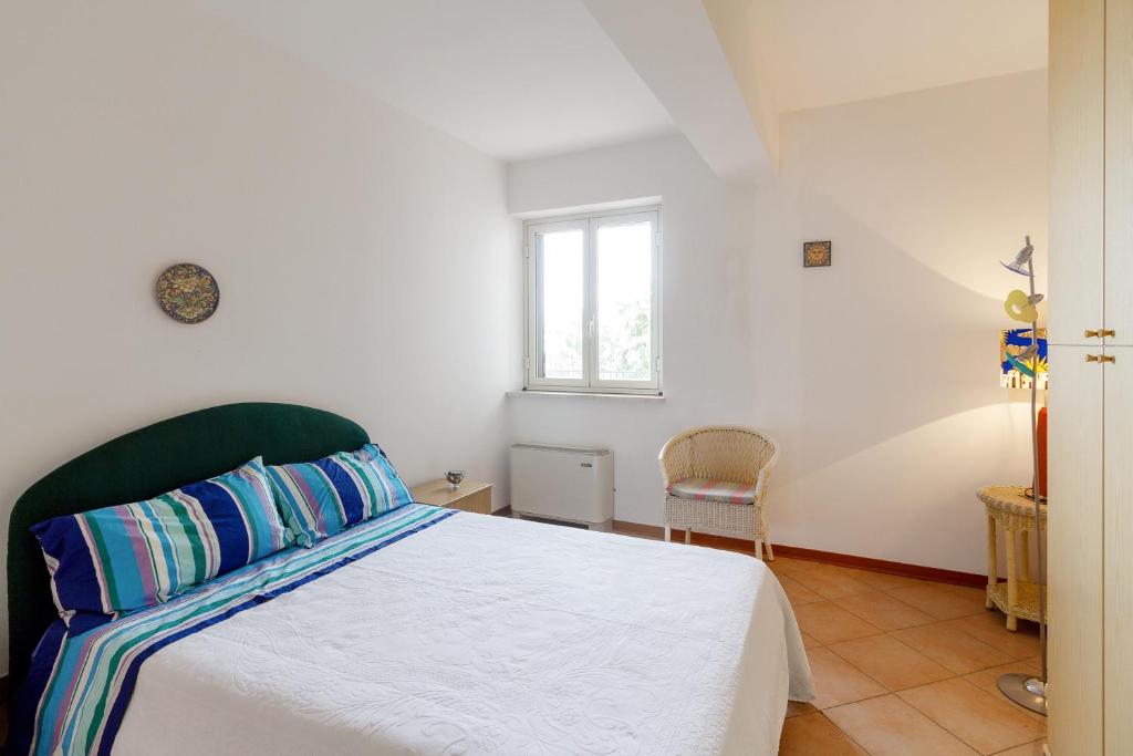 Posteľ alebo postele v izbe v ubytovaní Fontana Vecchia Seaview Apartment