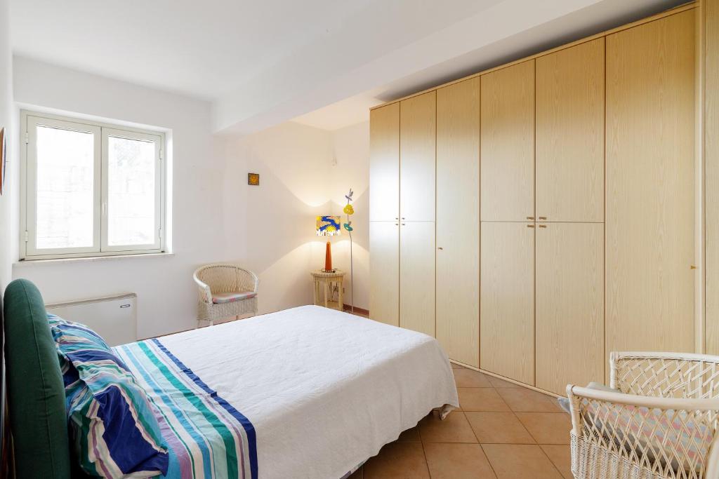 Posteľ alebo postele v izbe v ubytovaní Fontana Vecchia Seaview Apartment