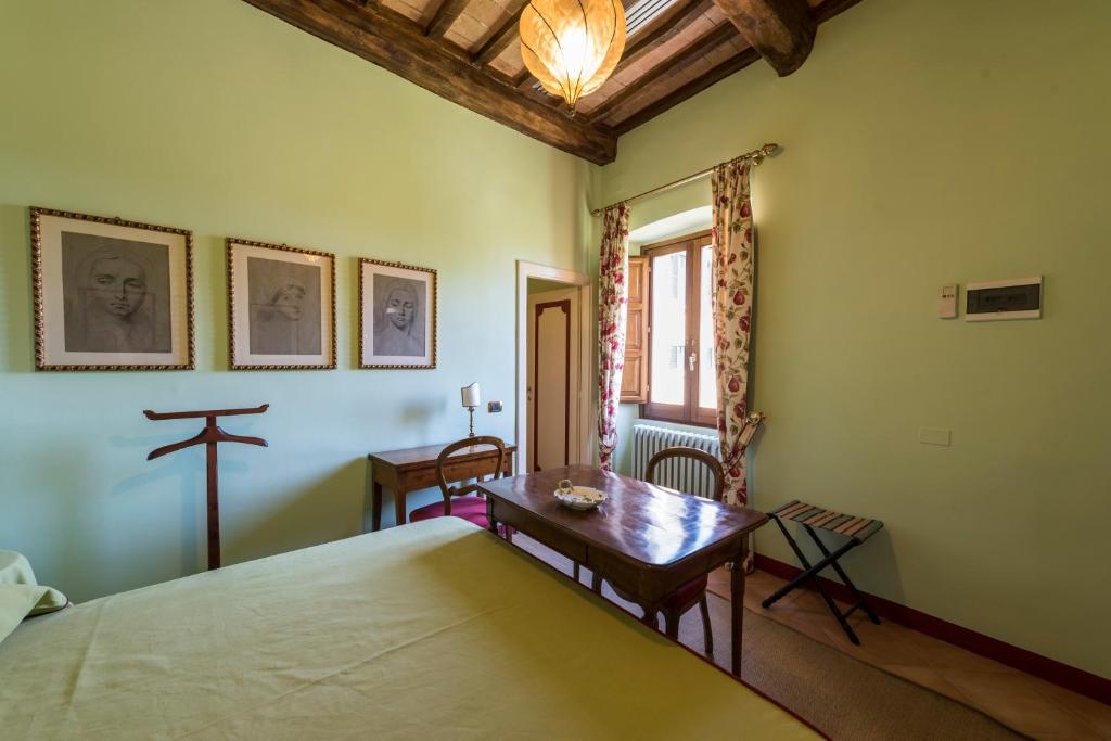 Gulta vai gultas numurā naktsmītnē Casa Limonaia a Perugia