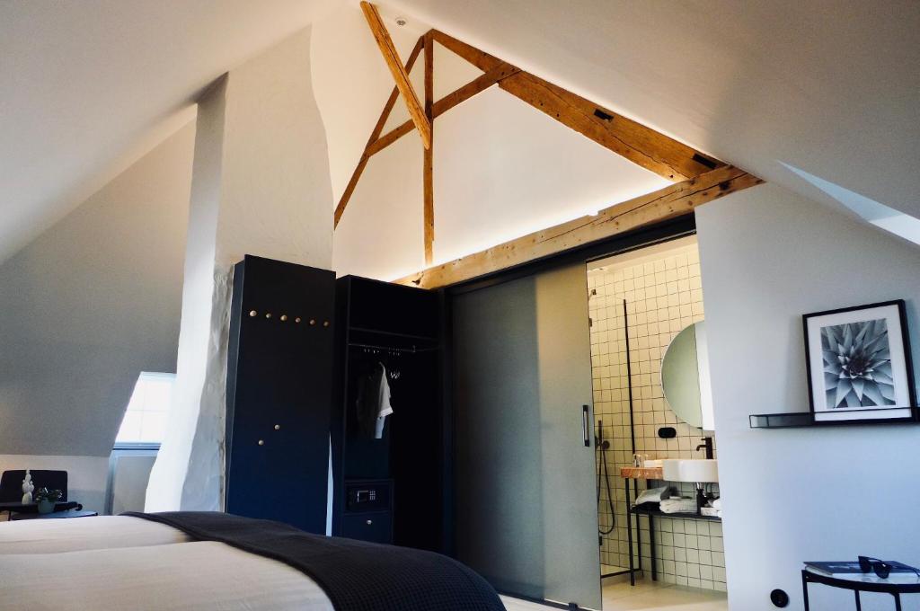 Postel nebo postele na pokoji v ubytování Hotel-Restaurant Beim Schlass