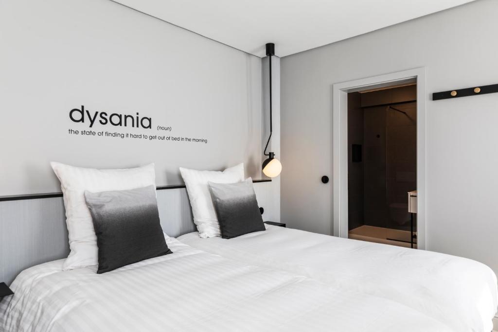 Postel nebo postele na pokoji v ubytování Hotel-Restaurant Beim Schlass