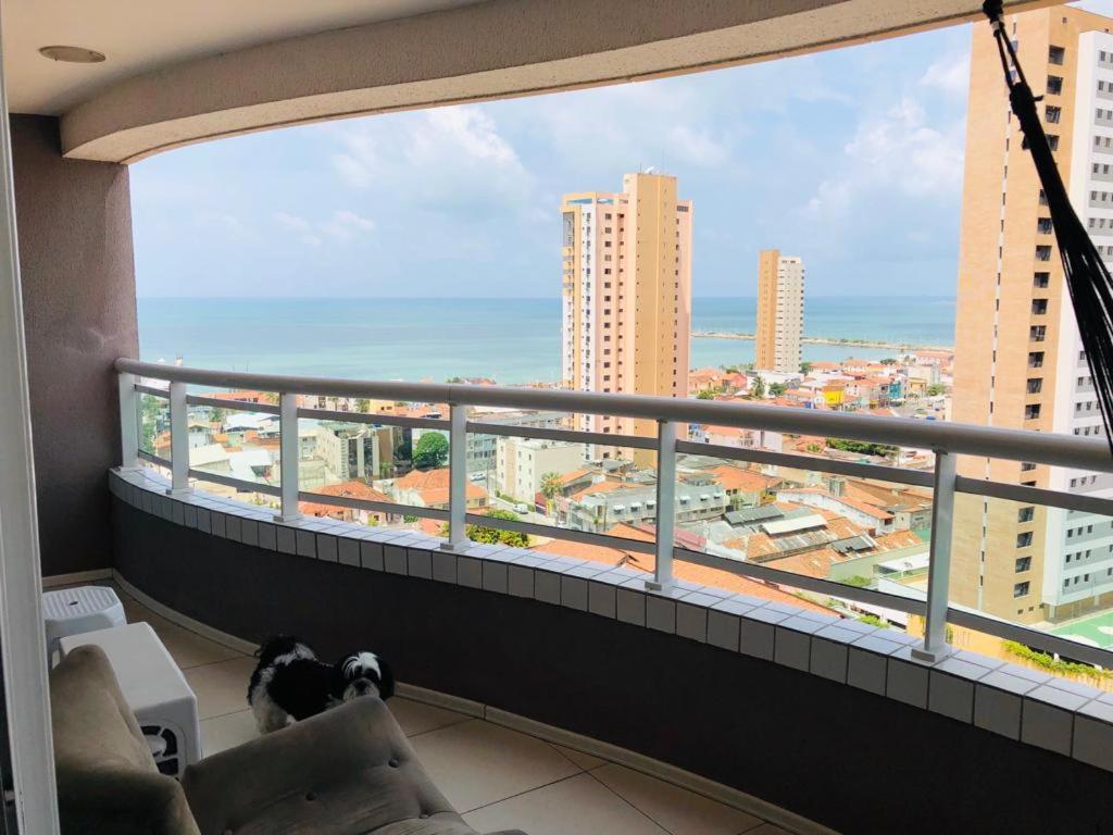 a balcony with a view of a city at Studio Iracema - APTO 1502 in Fortaleza
