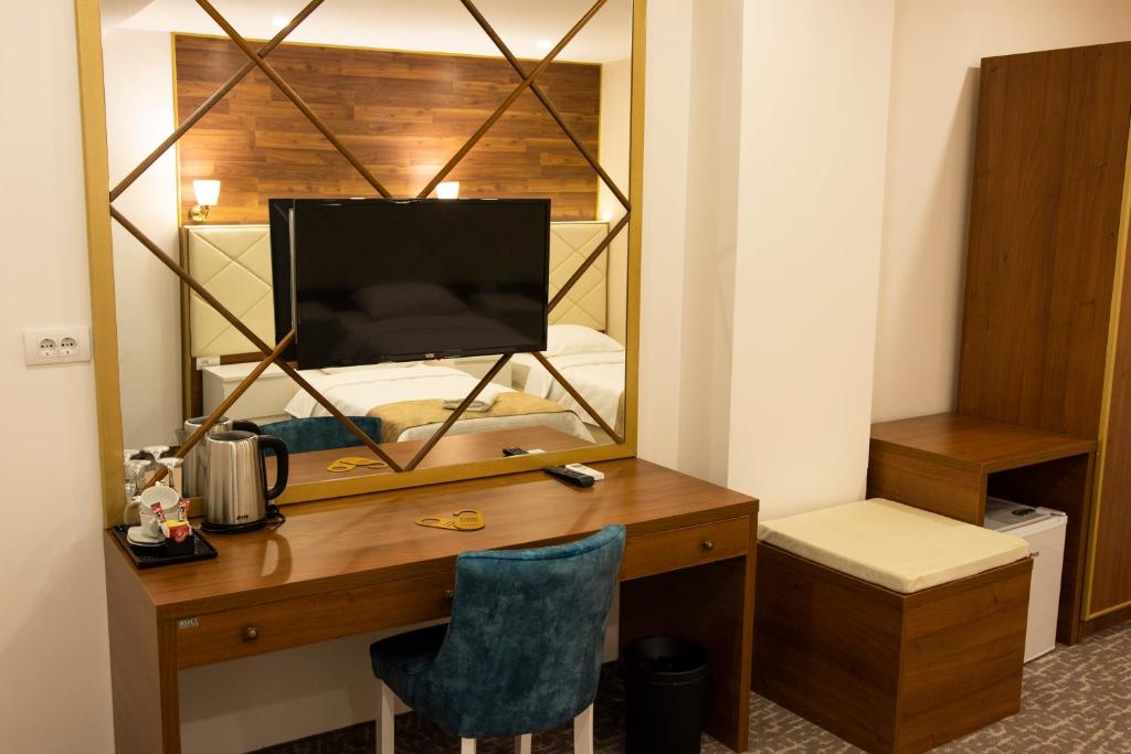 TV a/nebo společenská místnost v ubytování Luxury Rooms Skadarlija