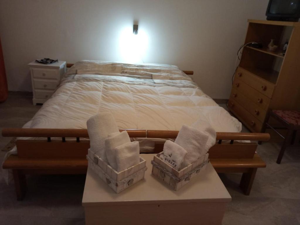 Ένα ή περισσότερα κρεβάτια σε δωμάτιο στο casa padre Jerone