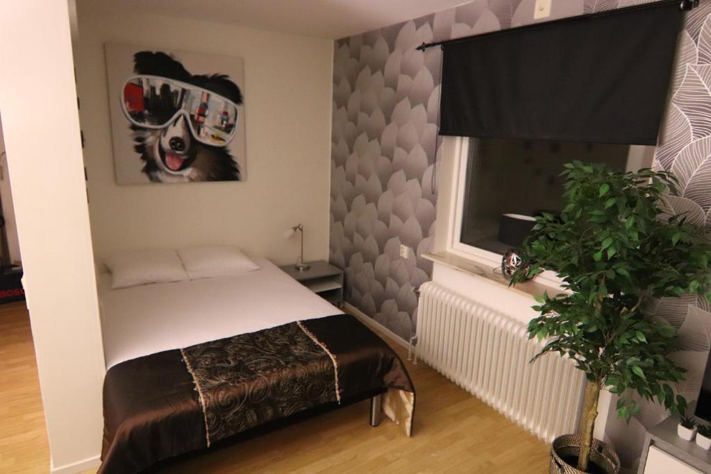 Postel nebo postele na pokoji v ubytování City HotelApartment