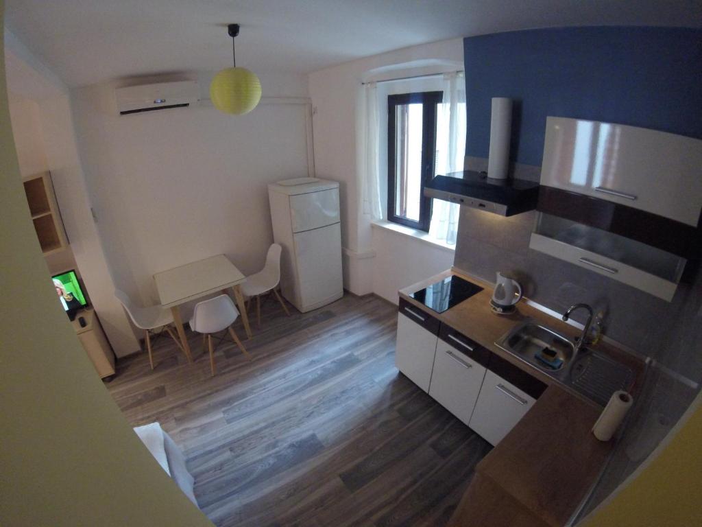 Kuchyňa alebo kuchynka v ubytovaní Apartment Kolega