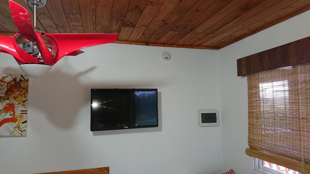 TV a/nebo společenská místnost v ubytování Cabañas 57