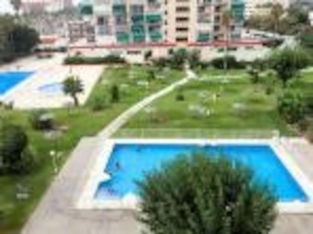 Bazén v ubytovaní M1 403 Frontal al Mar Vistas Terraza y Wifi alebo v jeho blízkosti