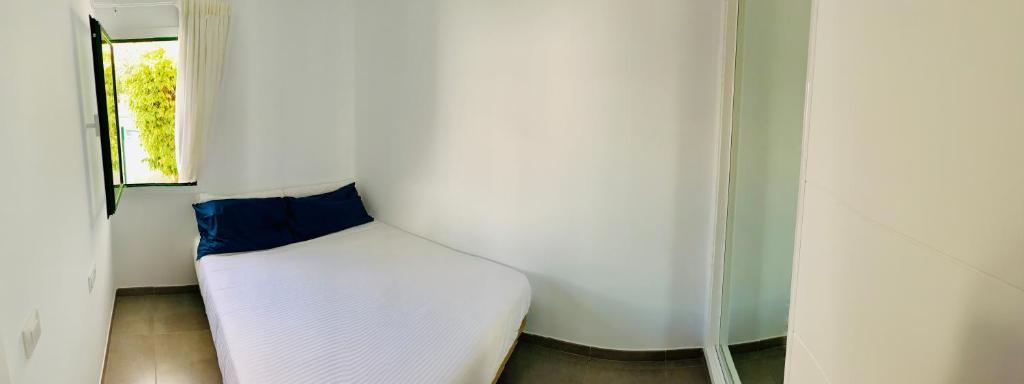 Postel nebo postele na pokoji v ubytování Apartamentos Zalabar