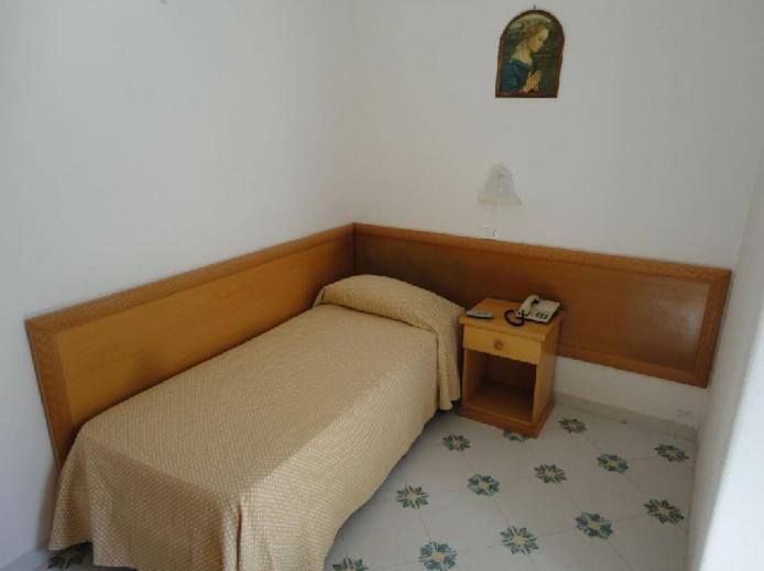 Postel nebo postele na pokoji v ubytování Hotel Candia