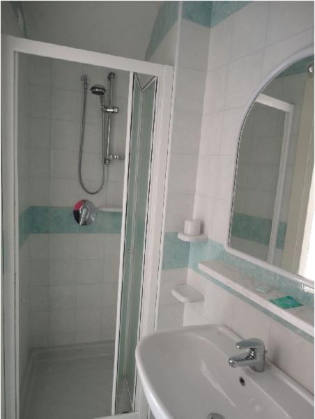 Koupelna v ubytování Hotel Candia