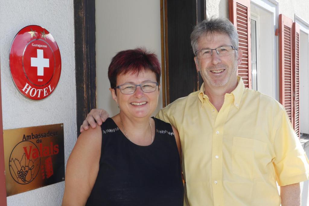 a man and a woman posing for a picture at Hotel Krone in Attinghausen