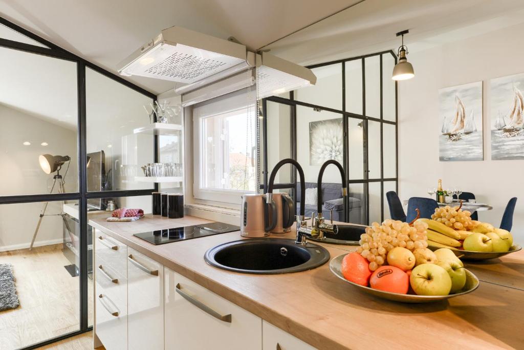 Kuchyňa alebo kuchynka v ubytovaní Exclusive Apartments WithLove Zadar