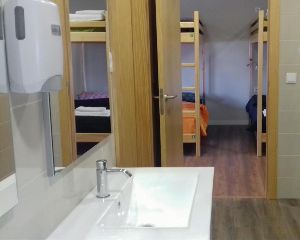 Postel nebo postele na pokoji v ubytování Hostel Criativo do Sabugueiro