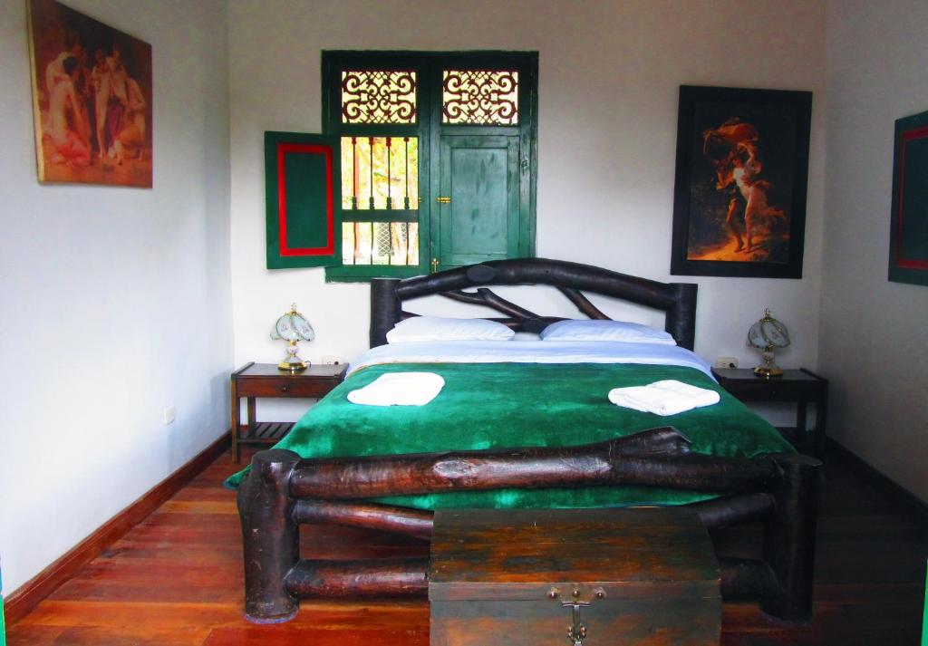 Postel nebo postele na pokoji v ubytování Finca Campestre La Adelita B&B