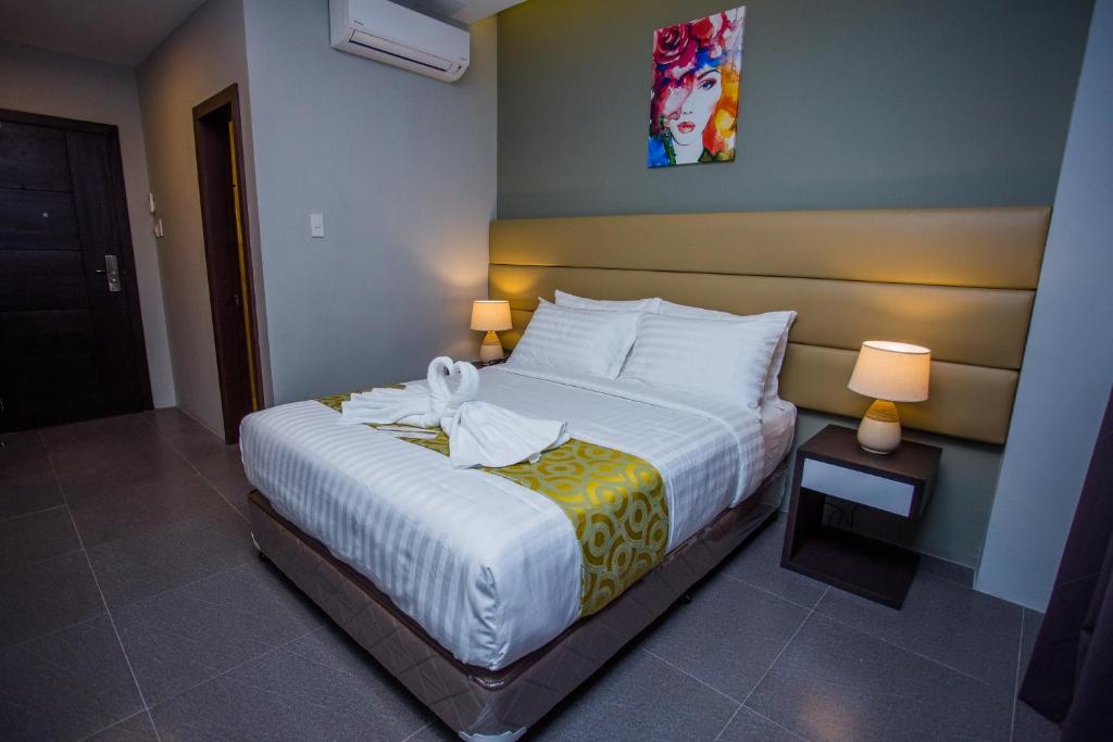Postel nebo postele na pokoji v ubytování Hotel Costa Brava