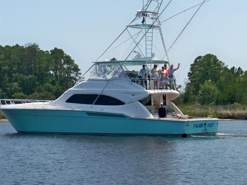 a group of people on a boat in the water at Holiday Pavilion Resort on the Boardwalk in Myrtle Beach