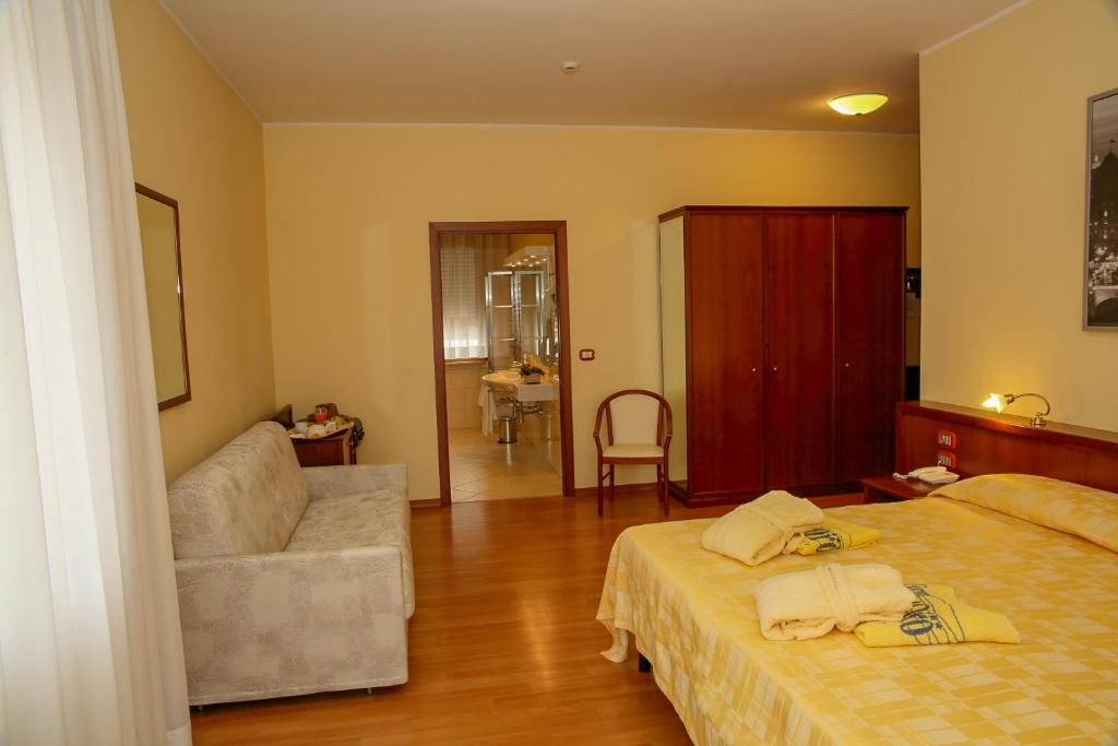Postel nebo postele na pokoji v ubytování Hotel Terme Vena D'Oro