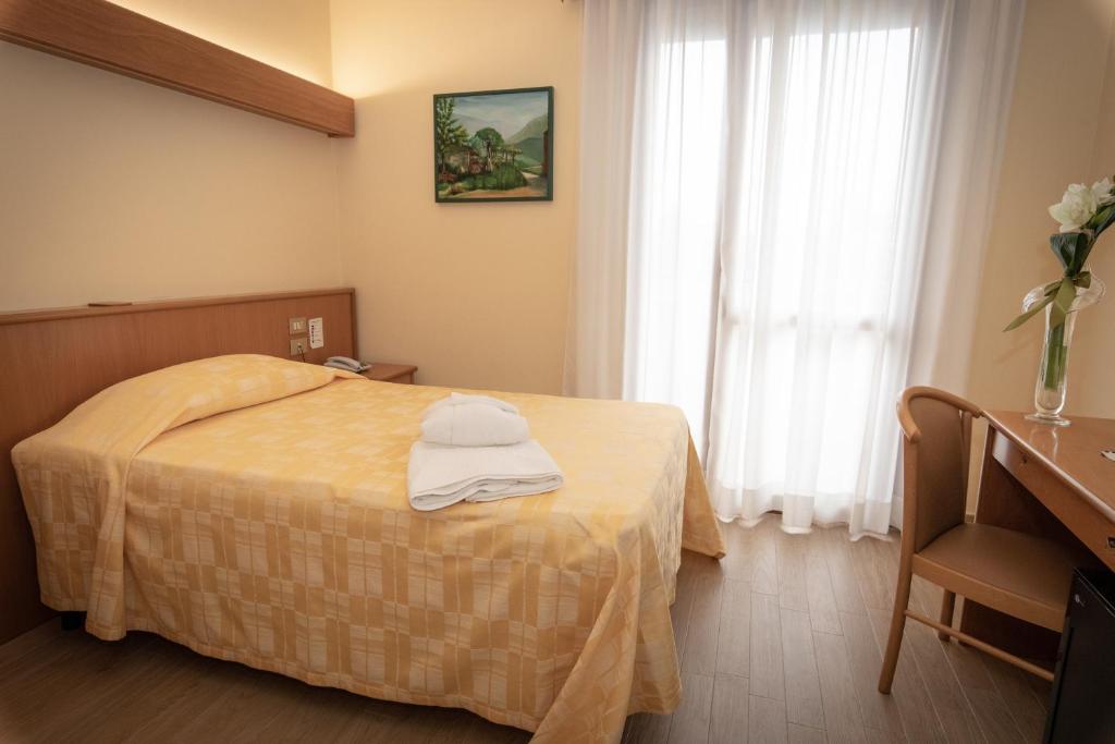 Postel nebo postele na pokoji v ubytování Hotel Terme Vena D'Oro