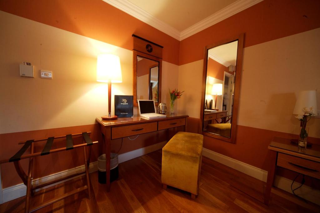 TV o dispositivi per l'intrattenimento presso The Fairview Boutique Hotel