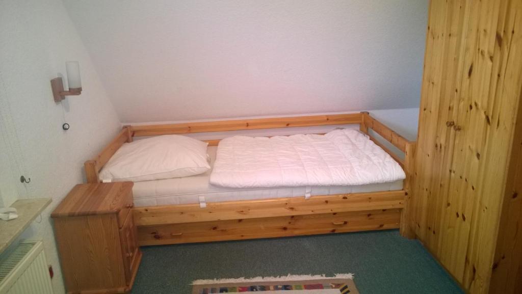 Postel nebo postele na pokoji v ubytování Haus Seestern