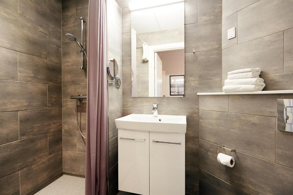 Koupelna v ubytování Hotel Vejlefjord