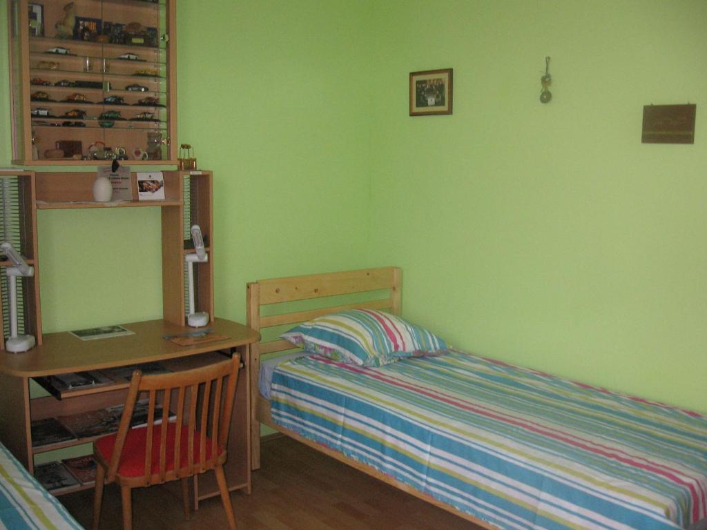 A bed or beds in a room at Bella