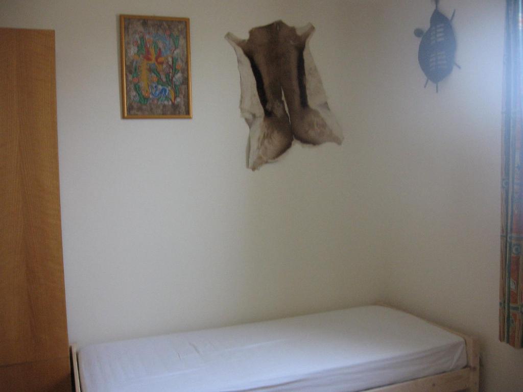 A bed or beds in a room at Bella