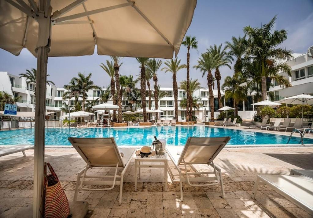 Bazén v ubytování Astral Palma Hotel nebo v jeho okolí