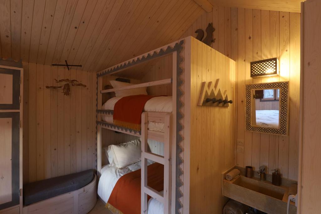 Postel nebo postele na pokoji v ubytování Douar Samra