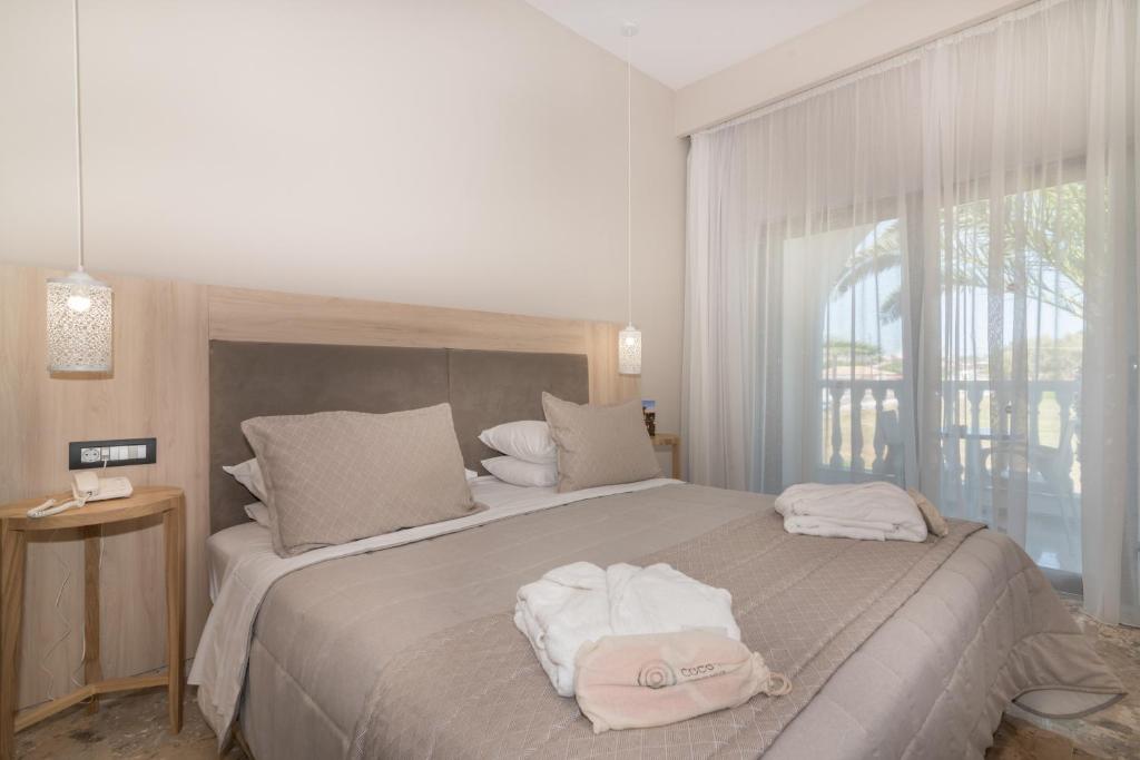Voodi või voodid majutusasutuse Venus Hotel toas