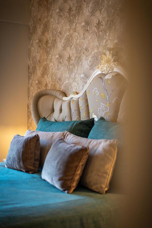 Postel nebo postele na pokoji v ubytování Achtis Hotel