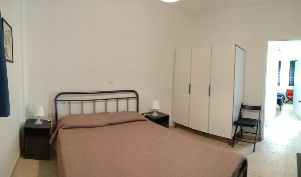 Posteľ alebo postele v izbe v ubytovaní Garden house Karystos